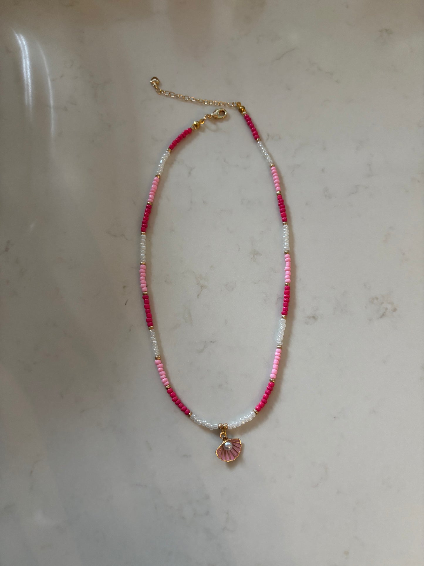 Roze schelp ketting