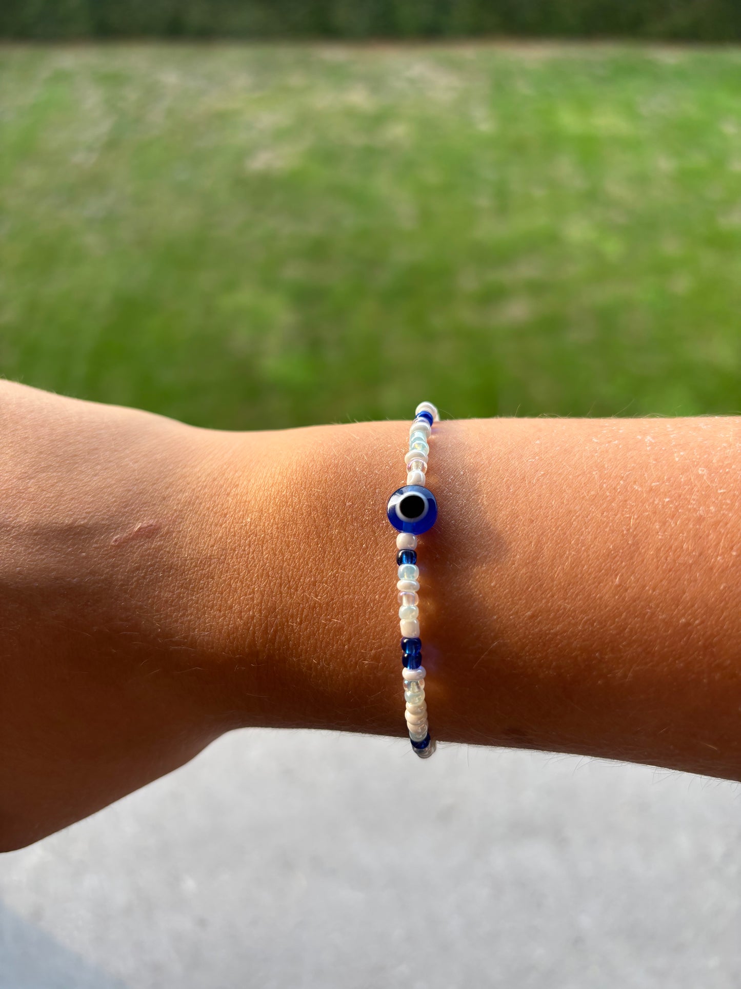Blauw armbandje met oogje